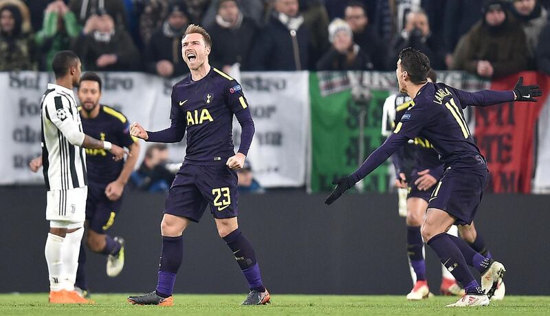 Tottenham's Christian Eriksen celebrates after scoring during the Champions League, round of 16 first-leg soccer match between Juventus and Tottenham Hotspurs, at the Allianz Stadium in Turin, Italy,  Tuesday, Feb. 13, 2018.  (Alessandro Di Marco/ANSA via AP)