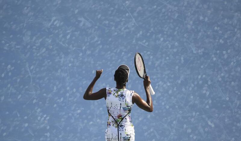 Venus Williams of the USA celebrates after she beats Flavia Pennetta of Italy during the quarter-final of the Dubai Duty Free Tennis Championships on February 20, 2014. Kamran Jebreili / AP Photo