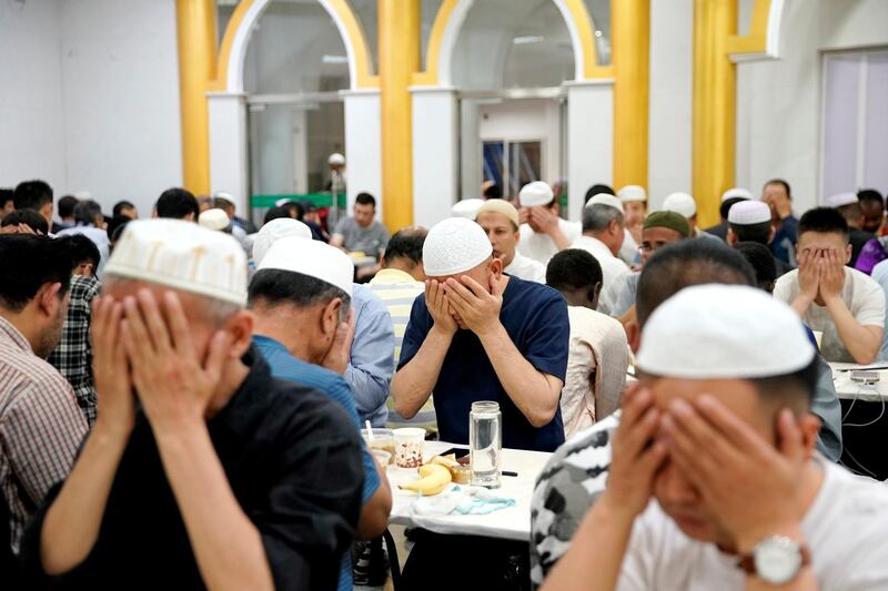 Muslims are seen having their iftar meal in Shanghai, China. Reuters