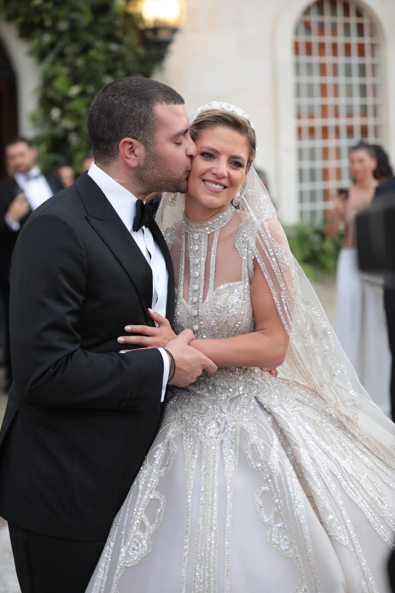 The newlyweds celebrate after their wedding. Photo: ParAzar