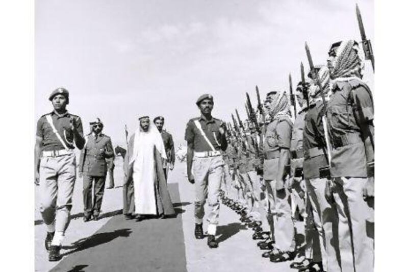 Sheikh Zayed reviews the troops at a military awards ceremony in 1976. Courtesy Al Ittihad