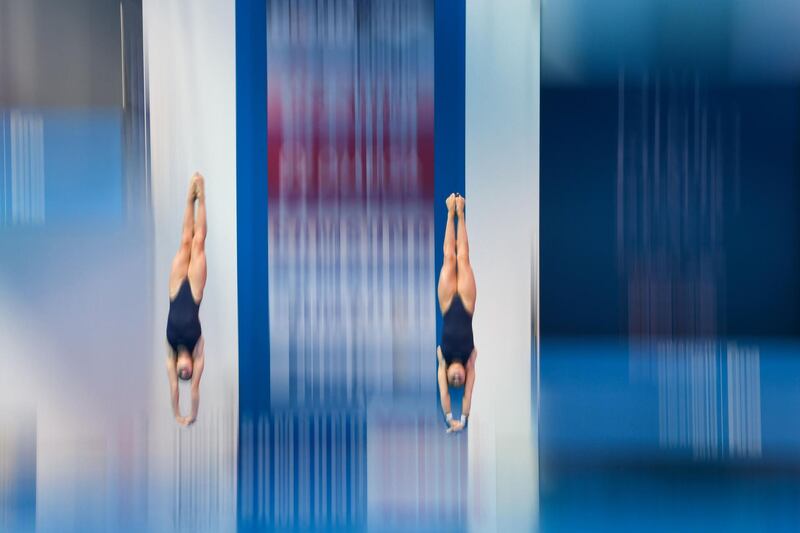 Romanians Nicoleta-Angelica Muscalu and Antonia-Mihaela Pavel compete in the women's synchronised 10m platform diving event during the 2019 World Championships at Nambu International Aquatics Centre in Gwangju, South Korea. AFP