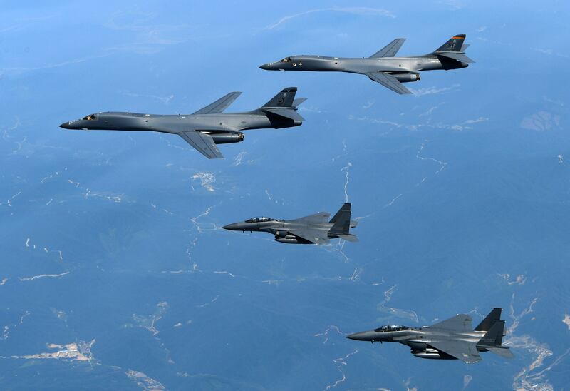 US B-1B bombers, top, and South Korean F-15K fighters over South Korea during exercises in June 2017.  AP