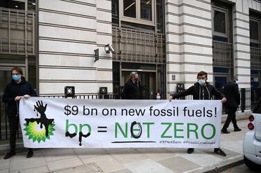 Protesters demonstrate against BP outside its headquarters during the company's annual shareholders meeting in London. The company aims to reduce greenhouse gas emissions from the oil and gas it produces to zero and cut the carbon intensity of its products in half by 2030. EPA