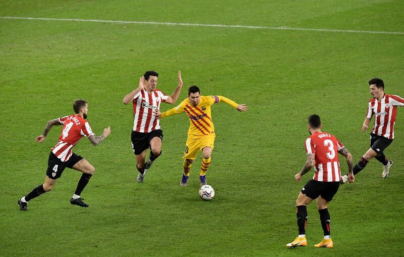Barcelona's Lionel Messi surrounded by four Bilbao players. AP