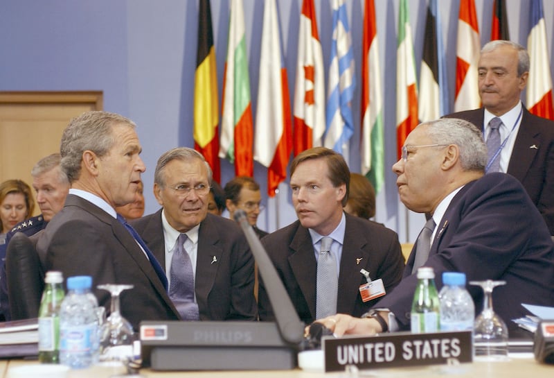 US President George W Bush, US Secretary of Defence Donald Rumsfeld, ambassador R Nicholas Burns and US Secretary of State Colin Powell attend the Nato summit in 2004 in Istanbul, Turkey