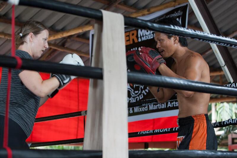 Laura Koot trains P-Noog at Tiger Muay Thai in Phuket, Thailand, Saturday, Jun. 15, 2013. (Photo by Mitch Viquez ©2013)