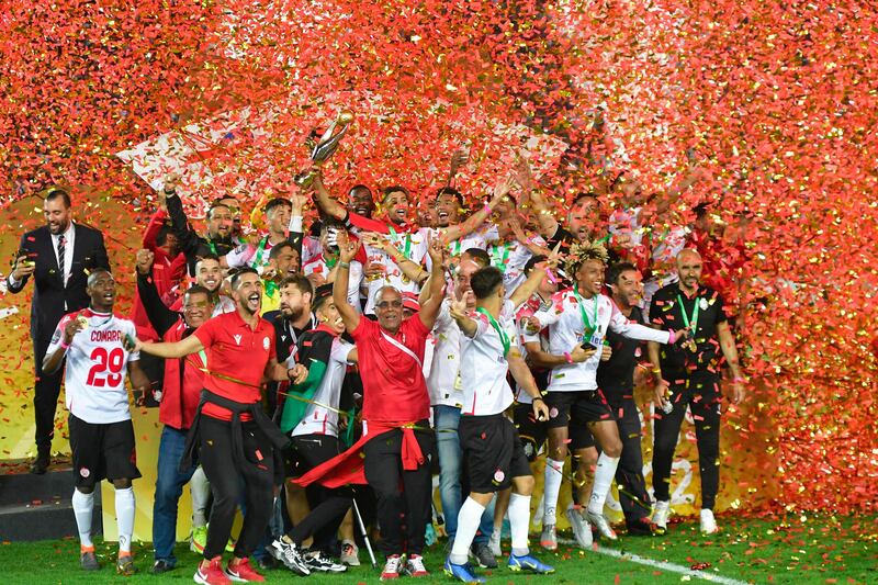 Wydad players celebrate after winning the CAF Champions League after defeating Al Ahly in Casablanca on May 30, 2022. AFP