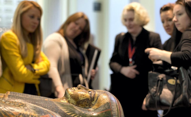 Mandatory Credit: Photo by Alastair Grant/AP/REX/Shutterstock (6772689a)
Members of the media stand around the Mummy of Tamut, a temple singer around 900 BC, during a press conference at the British Museum in London, . Scientists at the British Museum have used CT scans and volume graphics software to go beneath the bandages, revealing the skin, bones, internal organs, and in one case a brain-scooping rod left inside a skull by embalmers. The results are going on display in an exhibition which sets eight of the museum's mummies alongside detailed 3-D images of their insides
Britain Mummies, London, United Kingdom