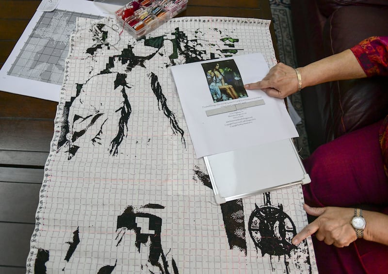 Varma chooses an image, prints it on an A3-size sheet then squares it off into 10 by 10 squares and then transfers on to the fabric that will be cross stitched