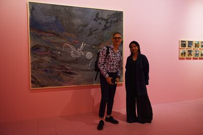 Artist Maitha Abdalla (right) with Sam Bardaouil, one of the curators of the Beyond: Emerging Artists Programme, at Abu Dhabi Art. Vidhyaa Chandramohan / The National