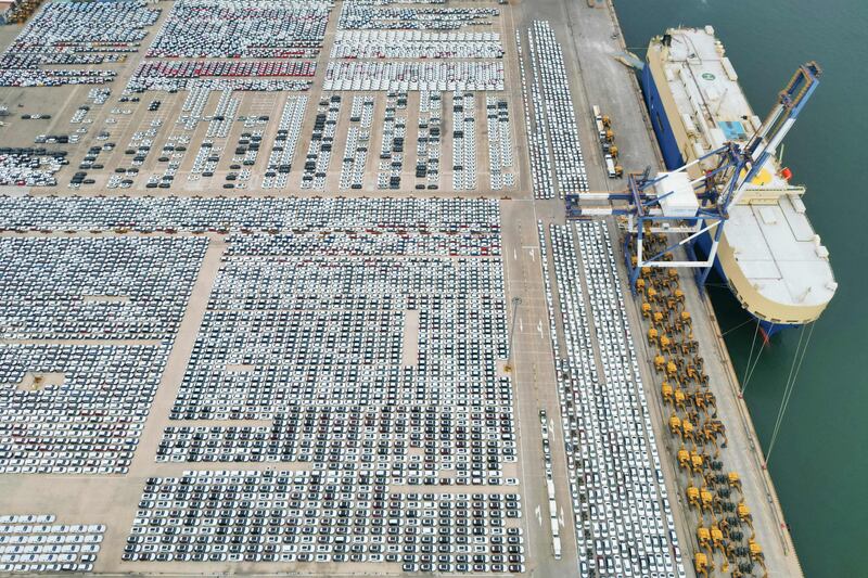 Newly produced cars are assembled in Yantai in China's eastern Shandong province for export. AFP