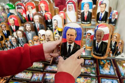 Russian wooden dolls at a Moscow souvenir shop depicting various world leaders. AP