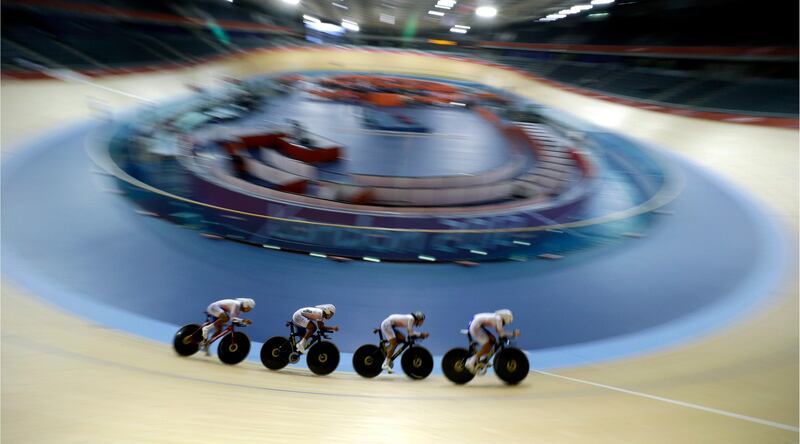 The South Korean men's cycling team trains for the 2012 Summer Olympics, Monday, July 30, 2012, in London. (AP Photo/Sergey Ponomarev) *** Local Caption ***  APTOPIX London Olympics Cycling Men.JPEG-08b1f.jpg