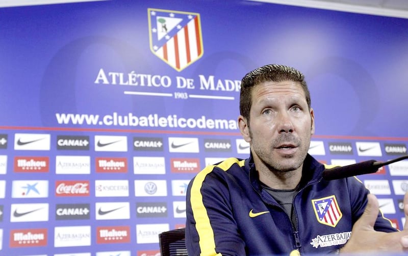 Atletico Madrid manager Diego Simeone speaks at a news conference on May 10, 2014. Neutrals may admire what Simeone and his team have accomplished, but that does not mean they necessarily want Atletico to win the Primera Liga. Fernando Alvarado / EPA