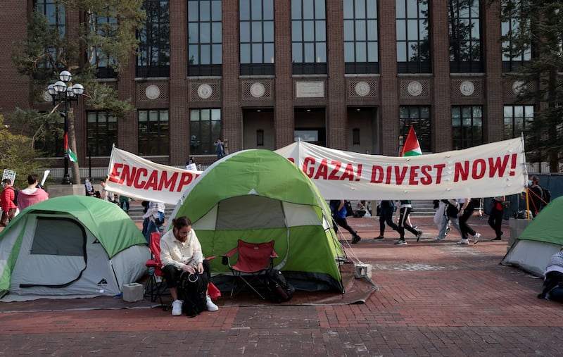 A coalition of University of Michigan students rally to pressure the university to divest its endowment from companies that support Israel. Reuters