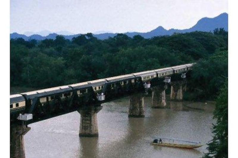 The Eastern & Oriental Express crosses the bridge over the River Kwai in Thailand. Ian Lloyd / Orient-Express Hotels (UK) Ltdver