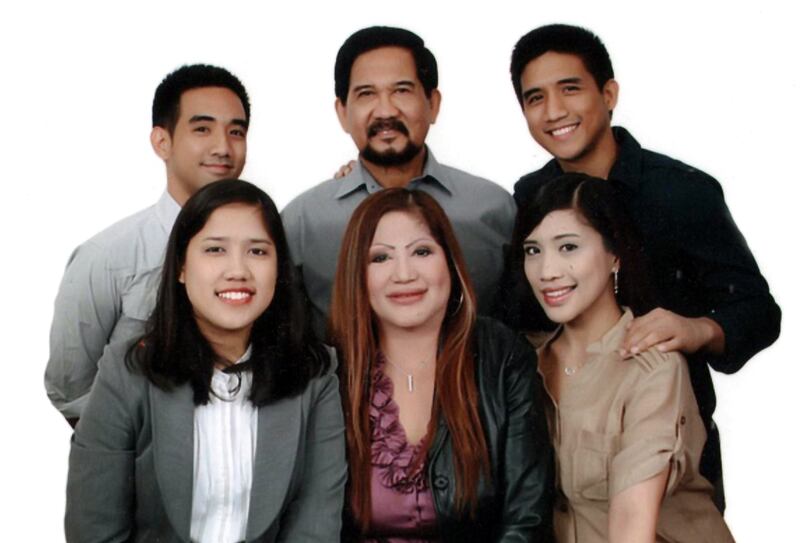 Lorna Lim Varona, front centre, whose body was found on stuffed in a bag in her car.  Courtesy Varona family