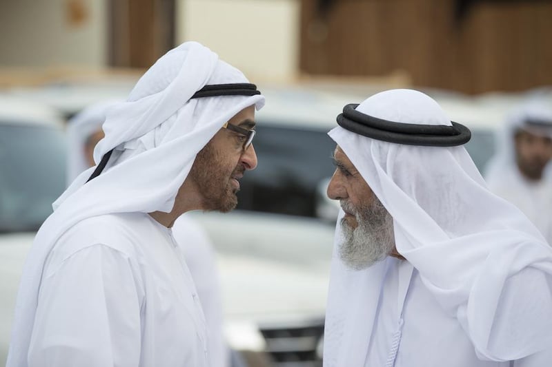 Sheikh Mohammed bin Zayed speaks with Mubarak bin Garan Al Mansoori. Ryan Carter / Crown Prince Court - Abu Dhabi 