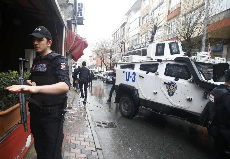 Special forces officers cordon off a street on March 3, 2016, following an attack by two women on a police station in the Istandbul suburb of Bayrampasa, Turkey. Osman Orsal / Reuters