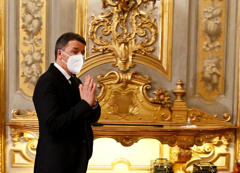 "Italia Viva" party leader Matteo Renzi leaves after answering journalists' questions at the Quirinale palace in Rome, as political forces meet with Italian President Sergio Mattarella on the creation of a new Italian government. Italian Premier Giuseppe Conte resigned after a key coalition ally pulled his party's support over Conte's handling of the coronavirus pandemic, setting the stage for consultations this week to determine if he can form a third government.  AP