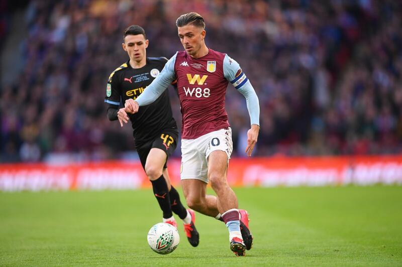 Jack Grealish takes on Phil Foden during the League Cup final between Aston Villa and Manchester City. Getty Images