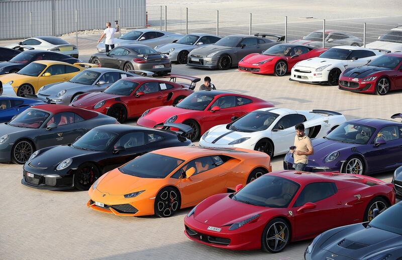 DUBAI, UNITED ARAB EMIRATES, August 31 – 2018 :- Members and Guests of the Ninth Degree supercars club parked their cars during the Ninth Degree supercars club meet held at Dubai Autodrome in Dubai. ( Pawan Singh / The National )  For Motoring. Story by Adam Workman