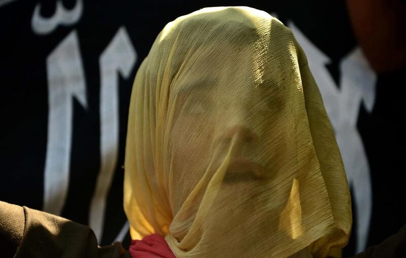 A Kashmiri protestor is seen during a protest against civilian killings in Srinagar.  Tauseef Mustafa / AFP