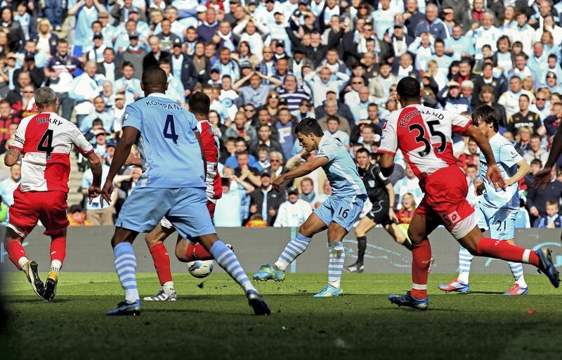 MANCHESTER, ENGLAND - MAY 13:  Sergio Aguero of Manchester City scores his team's third and matchwinning goal during the Barclays Premier League match between Manchester City and Queens Park Rangers at the Etihad Stadium on May 13, 2012 in Manchester, England.  (Photo by Alex Livesey/Getty Images)