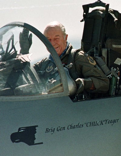 FILE PHOTO: Retired Air Force General Chuck Yeager waves to the crowd after breaking the sound barrier during ceremonies for the 50th anniversary of his first supersonic flight at Edwards Air Force Base, California, U.S. October 14, 1997. REUTERS/Sam Mircovich/File Photo