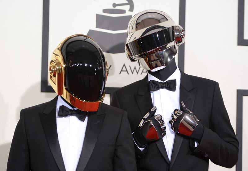 Daft Punk, a nominee for Best Album Of The Year 'Random Access Memories' arrive on the red carpet for the 56th Grammy Awards at the Staples Center in Los Angeles, California, in 2014. AFP