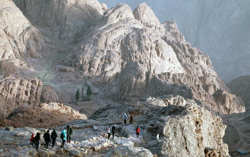 Tourists make their way towards the monastery of St Catherine, after watching the sunrise on top of Mount Moses in Saint Catherine city, in Egypt's South Sinai Governorate. EPA