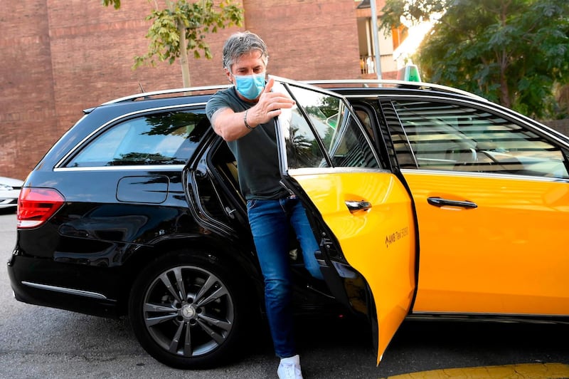 Jorge Messi arrives at his apartment in Barcelona. AFP