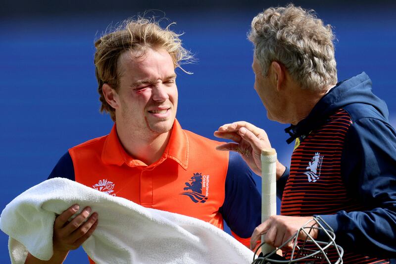  Bas de Leede walks off the field after being struck by a delivery from Pakistan's Haris Rauf. AFP