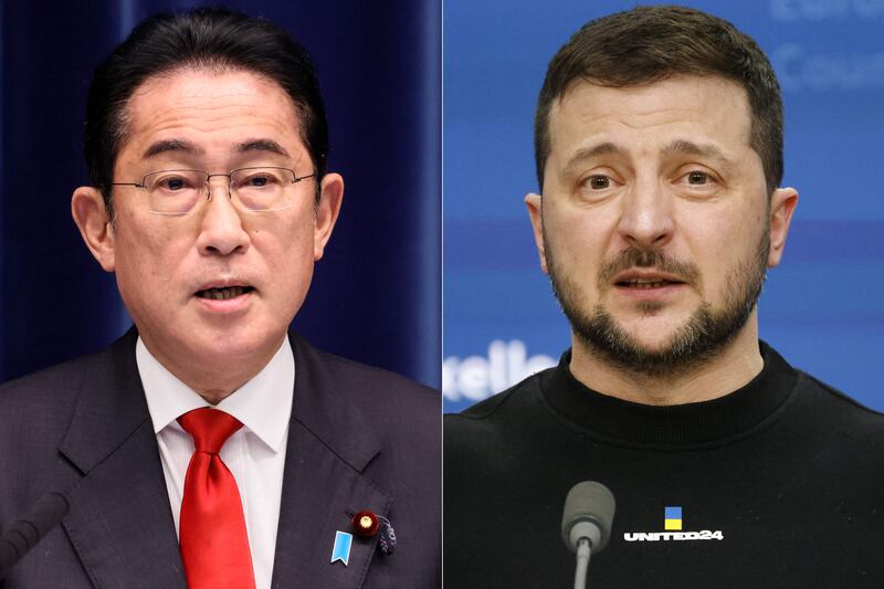 Japan's Prime Minister Fumio Kishida, left, and Ukraine's President Volodymyr Zelenskyy. AFP