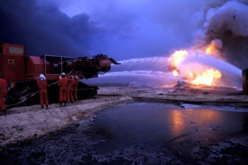 A Hungarian team of firefighters work to extinguish an oil fire in Burgan Oil Field, 45 Km South Kuwait City in this file photo taken March, 1991. (Photo:Gustavo Ferrari/The National) 