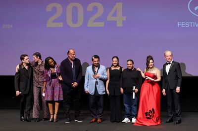 The cast of Saudi film Norah on stage at Cannes. Getty Images
