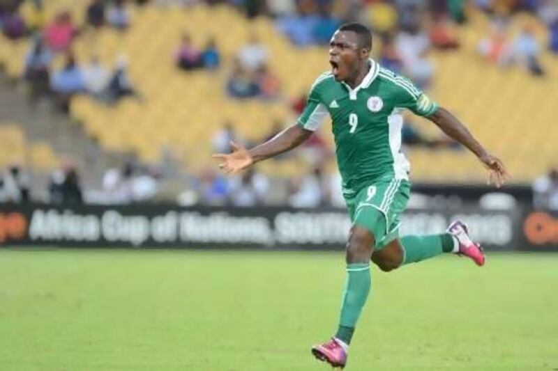 Emmanuel Emenike, above, gave Nigeria the early lead. Ivory Coast would tie the game but Sunday Mba's strike at the 78th minute would deliver Nigeria to the semi-finals of the African Cup of Nations.