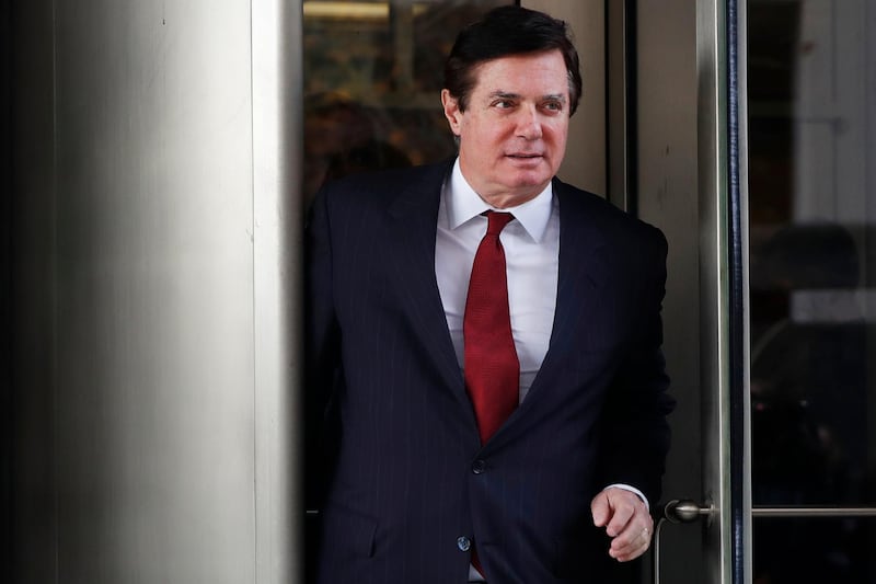 In this Nov. 6, 2017 photo, Paul Manafort, President Donald Trump's former campaign chairman, leaves the federal courthouse in Washington. A federal judge in Washington says special counsel Robert Mueller was working within his authority when he brought charges against President Donald Trumpâ€™s former campaign chairman.   (AP Photo/Jacquelyn Martin)