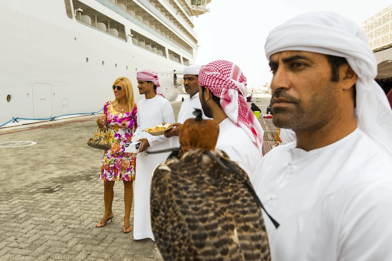 Abu Dhabi, United Arab Emirates, October 23, 2017:    Passengers disembark from the Seabourn Encore ship at the cruise terminal in the Mina Zayed area of Abu Dhabi on October 23, 2017. Christopher Pike / The National

Reporter: John Dennehy
Section: News