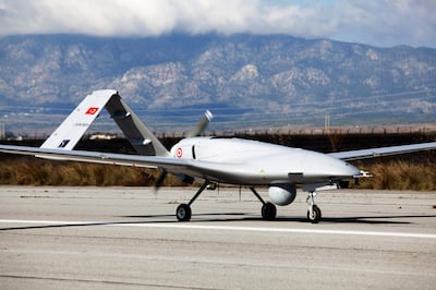 The Bayraktar TB2 drone is pictured on December 16, 2019 at Gecitkale Airport in Famagusta in the self-proclaimed Turkish Republic of Northern Cyprus (TRNC). The Turkish military drone was delivered to northern Cyprus today amid growing tensions over Turkey's deal with Libya that extended its claims to the gas-rich eastern Mediterranean. The Bayraktar TB2 drone landed in Gecitkale Airport in Famagusta around 0700 GMT, an AFP correspondent said, after the breakaway northern Cyprus government approved the use of the airport for unmanned aerial vehicles. It followed a deal signed last month between Libya and Turkey that could prove crucial in the scramble for recently discovered gas reserves in the eastern Mediterranean.
 / AFP / Birol BEBEK
