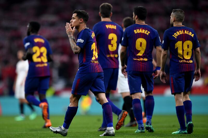 Philippe Coutinho celebrates after scoring from the spot for the Barcelona's fifth goal during their Copa del Rey final against Sevilla at the Wanda Metropolitano stadium in Madrid. David Ramos / Getty Images