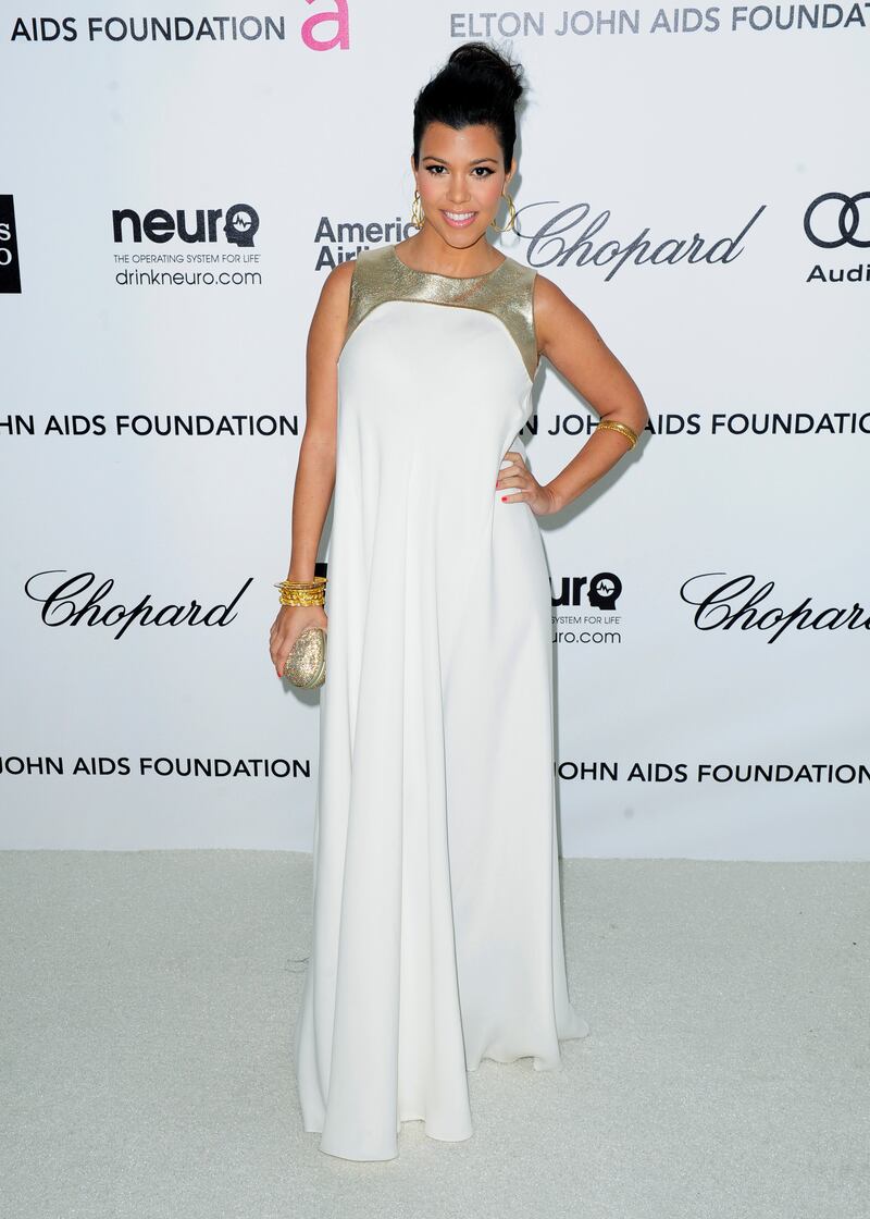 Kourtney Kardashian, in white Raoul, arrives at the 20th annual Elton John Aids Foundation Academy Awards Viewing Party in West Hollywood on February 26, 2012. Reuters