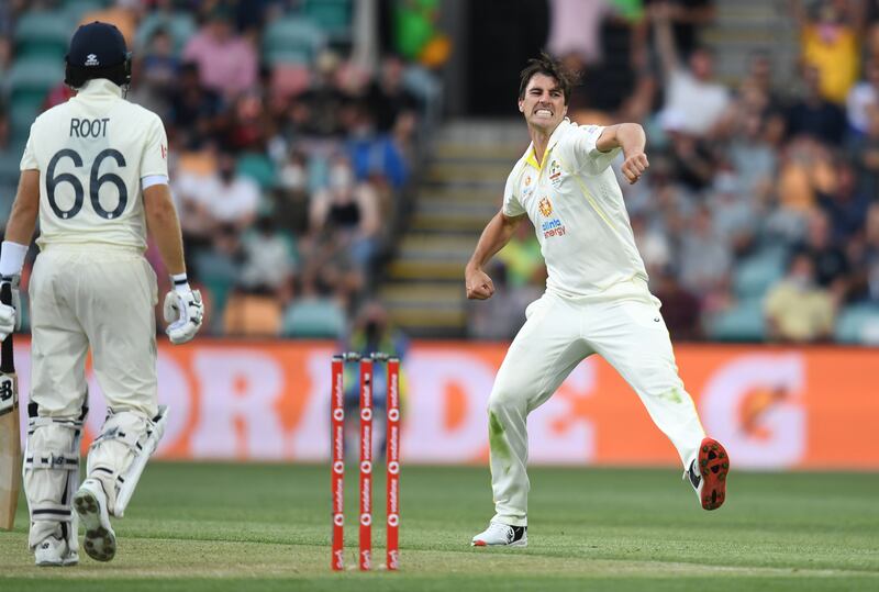 Australia captain Pat Cummins celebrates taking the wicket of his England counterpart  Joe Root during Day 2 of the fifth Ashes Test at the Blundstone Arena, Hobart, on Saturday, January 15, 2022. PA