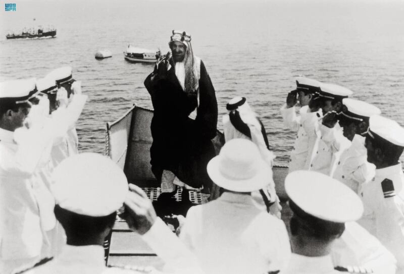 King Abdulaziz is greeted by American soldiers in 1945.