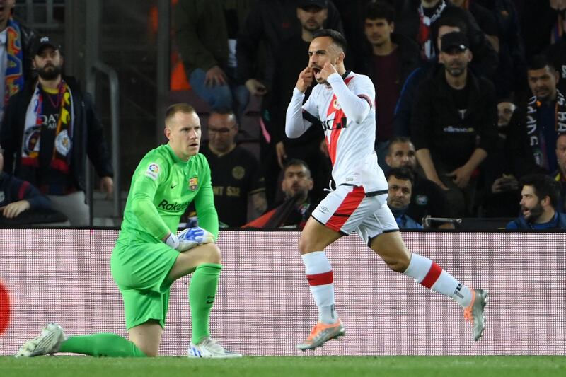 Rayo Vallecano's Spanish midfielder Alvaro Garcia Rivera celebrates after scoring the only goal of the game against Barcelona at Camp Nou on April 24, 2022. AFP