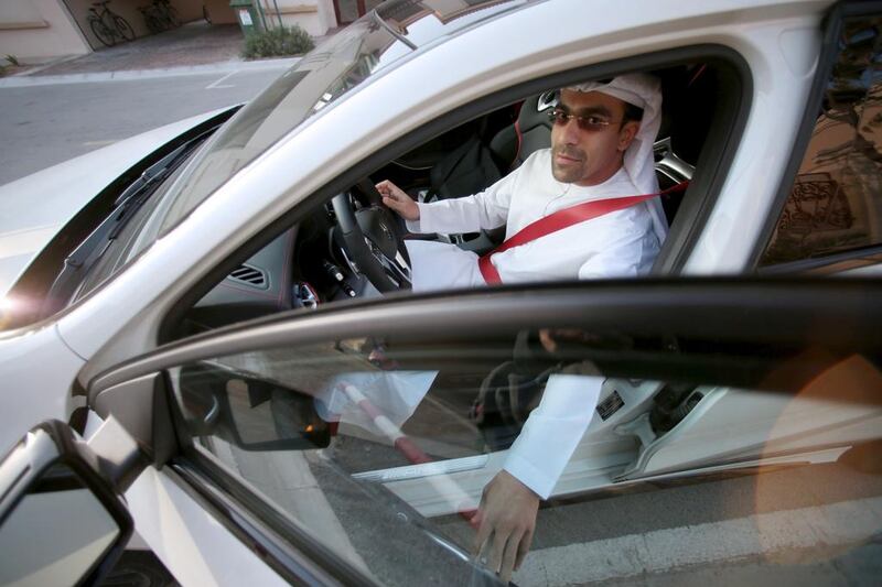 Saeed Al Darmaki gets in his car to drive to work from his home in Golf Gardens area of Abu Dhabi on March 5, 2015. Fuel prices were liberalised this year and intially rose before falling to below the level before the alteration. Christopher Pike / The National