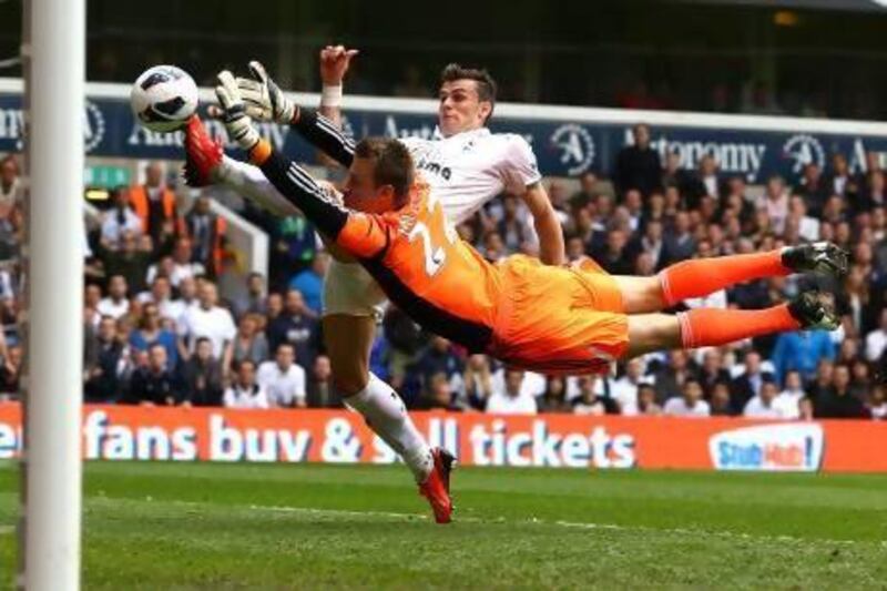 Sunderland goalkeeper Simon Mignolet, below, stopped Tottenham’s Gareth Bale this time but Bale would score later on.