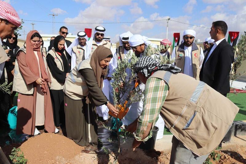 Sheikha Shamma planted an olive tree during her visit