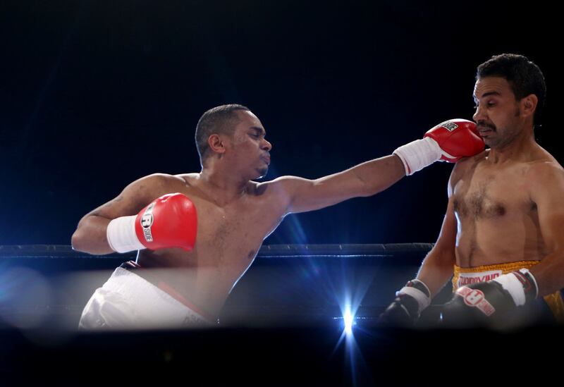 Ahmed Al Ali v Mohammed Abbas. The Emirati Al Ali, in white, won in the second round when the Egyptian Abbas was disqualified for a headbutt. Sammy Dallal / The National